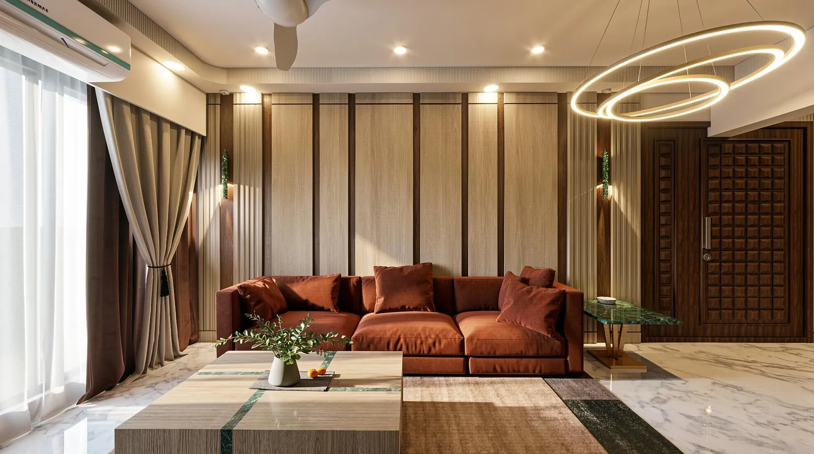 A living room with a rust-coloured sofa, timber wall panelling, layered curtains and a ring-shaped pendant light over a marble floor